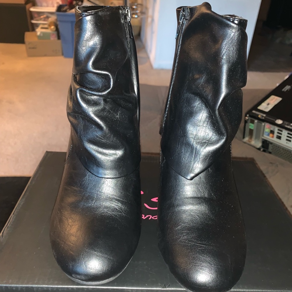 Women’s black heeled booties